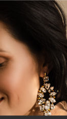Woman Modeling Golden Earings