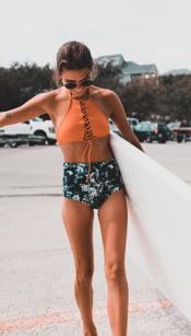 Girl with Surf Board 